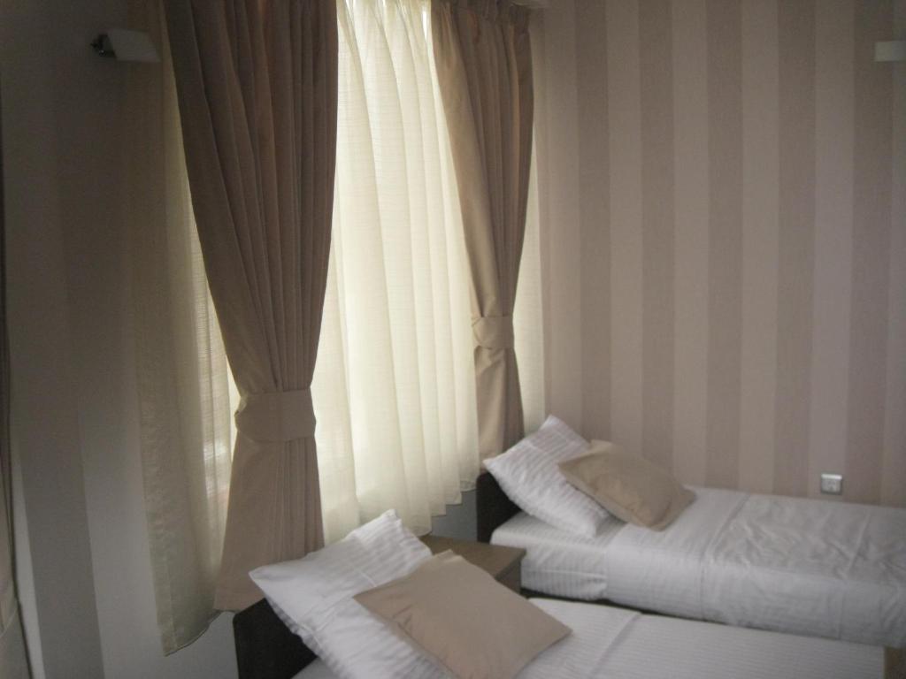 Domus Aparthotel Skopie Habitación foto